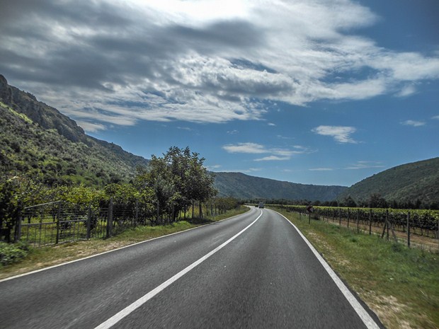 Road beside Neretva river