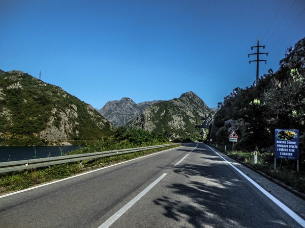 Road beside Neretva river