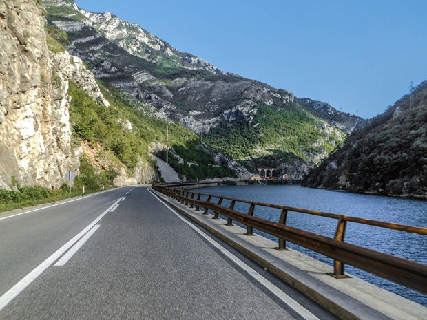 Road beside Neretva river